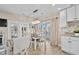 Cozy dining area with a table, seating, and access to a deck at 6001-1205 S Kings Hwy., Myrtle Beach, SC 29575