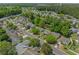 The home boasts a prime location nestled alongside a tranquil waterway in the aerial neighborhood view at 622 Oakhurst Dr., Myrtle Beach, SC 29579