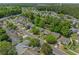 An aerial view showcases the property's setting in a serene residential neighborhood near the waterway at 622 Oakhurst Dr., Myrtle Beach, SC 29579