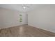 This bedroom features wood-look flooring, neutral walls and natural light at 622 Oakhurst Dr., Myrtle Beach, SC 29579