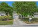 Charming one-story home with a well-manicured lawn and mature trees at 622 Oakhurst Dr., Myrtle Beach, SC 29579