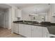 Bright kitchen area with stainless steel sink and an open view to the living spaces at 622 Oakhurst Dr., Myrtle Beach, SC 29579