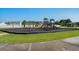 Community playground with swings, slide, and monkey bars on a large grassy area at 622 Oakhurst Dr., Myrtle Beach, SC 29579
