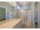 Bathroom with dual shower stalls, double sink vanity, and large mirror at 6486 Somersby Dr., Murrells Inlet, SC 29576