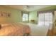 Spacious bedroom with carpet flooring, dual windows and sliding glass door to patio at 6486 Somersby Dr., Murrells Inlet, SC 29576