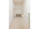 Walk-in closet with built-in shelving, drawers, and a decorative upholstered seat at 6486 Somersby Dr., Murrells Inlet, SC 29576