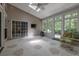Bright sunroom with tile flooring, vaulted ceilings and plenty of natural light, perfect for relaxing at 6486 Somersby Dr., Murrells Inlet, SC 29576