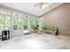 Bright sunroom with tile flooring, vaulted ceilings and plenty of natural light, perfect for relaxing at 6486 Somersby Dr., Murrells Inlet, SC 29576
