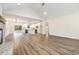 Open floor plan featuring hardwood floors, fireplace, and an open layout to the kitchen at 7103 Louisville Rd., Aynor, SC 29511