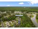 A high angle view showcases a tranquil neighborhood with picturesque landscaping, near serene lakes and ponds at 8008 Mcsweeney Ct., Myrtle Beach, SC 29588