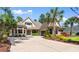 Charming home featuring stone accents, a well-manicured lawn, and a spacious driveway, perfect for curb appeal at 8008 Mcsweeney Ct., Myrtle Beach, SC 29588