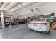 Spacious three-car garage with ample storage, two cars, and overhead lighting at 8008 Mcsweeney Ct., Myrtle Beach, SC 29588