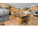 Gourmet kitchen with granite countertops, stainless steel appliances, and a large island with seating at 8008 Mcsweeney Ct., Myrtle Beach, SC 29588