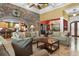 Inviting living room featuring stone accents, tray ceilings, and lots of space for entertaining at 8008 Mcsweeney Ct., Myrtle Beach, SC 29588