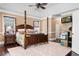 Comfortable bedroom featuring a four-poster bed, neutral colors, and ample natural light at 8008 Mcsweeney Ct., Myrtle Beach, SC 29588