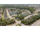 Aerial view of a neighborhood showcasing homes, ponds, and beautifully landscaped streets at 801 Celene Ct., Myrtle Beach, SC 29579