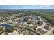 Drone shot displaying a pond-studded neighborhood with well-maintained houses and lush landscaping at 801 Celene Ct., Myrtle Beach, SC 29579