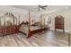 Bedroom featuring two beds, wooden furniture, ceiling fan, and natural light at 801 Celene Ct., Myrtle Beach, SC 29579