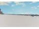 Wide sandy beach with people enjoying sunny weather under colorful umbrellas at 9550 Shore Dr. # 633, Myrtle Beach, SC 29572