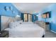 Bright bedroom featuring two beds with white linens and a private balcony at 9550 Shore Dr. # 633, Myrtle Beach, SC 29572