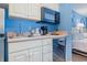 A compact kitchen featuring stainless steel appliances at 9550 Shore Dr. # 633, Myrtle Beach, SC 29572