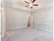 Spacious bedroom with carpet, ceiling fan, and doorway to hall at 108 Old Chimney Ln, Conway, SC 29526