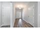 Inviting foyer with durable flooring, white doors, and natural light at 108 Old Chimney Ln, Conway, SC 29526