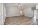 Spacious living room with luxury vinyl flooring, vaulted ceiling, and ample natural light at 108 Old Chimney Ln, Conway, SC 29526