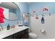 Charming bathroom with nautical decor, offering a fresh and cheerful ambiance at 1313 Cascarilla Ct., Myrtle Beach, SC 29579