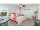 Comfortable bedroom with plush bedding, soft lighting, and bright natural light at 1313 Cascarilla Ct., Myrtle Beach, SC 29579