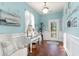 Bright foyer features hardwood floors, stylish decor, and a welcoming ambiance at 1313 Cascarilla Ct., Myrtle Beach, SC 29579
