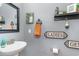 Stylish half bathroom with a modern vessel sink, decorative mirror, and charming wall décor at 1313 Cascarilla Ct., Myrtle Beach, SC 29579