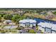 Aerial view shows a luxury building with beautiful landscaping and many amenities at 1352 Villa Marbella Ct. # 1-204, Myrtle Beach, SC 29572