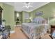 Comfortable bedroom featuring a ceiling fan, stylish decor, and neutral paint at 1352 Villa Marbella Ct. # 1-204, Myrtle Beach, SC 29572