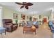 Open-concept living room featuring a spacious layout, comfortable seating, and seamless flow into the dining area at 1352 Villa Marbella Ct. # 1-204, Myrtle Beach, SC 29572