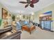 Comfortable living room with a large sofa, stylish TV console, and an open layout perfect for entertaining at 1352 Villa Marbella Ct. # 1-204, Myrtle Beach, SC 29572