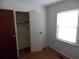 Bedroom featuring wood-look floors, closet, and a neutral color palette at 1465 Dirty Branch Rd., Conway, SC 29527