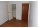 An airy bedroom with closet space and wood-look flooring at 1465 Dirty Branch Rd., Conway, SC 29527