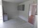 Spacious kitchen showing gray cabinets, tile flooring, and modern appliances, ready for customization at 1465 Dirty Branch Rd., Conway, SC 29527