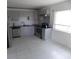 Modern kitchen features stainless steel appliances, gray cabinets, and a stylish backsplash at 1465 Dirty Branch Rd., Conway, SC 29527