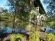 View of river under bridge, surrounded by lush greenery and a peaceful waterfront atmosphere at 1465 Dirty Branch Rd., Conway, SC 29527
