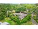 Aerial view of the property showing the metal roof and a view of the surrounding lush greenery at 1506 7Th Ave., Conway, SC 29526