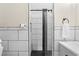 Modern bathroom with white subway tile, dark accents and a walk-in shower at 1506 7Th Ave., Conway, SC 29526