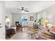 Comfortable living room with ceiling fan, hardwood floors and plenty of natural light at 1506 7Th Ave., Conway, SC 29526
