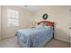 Comfortable bedroom featuring a queen-sized bed with a nightstand and wreath on the wall at 1524 Culbertson Ave., Myrtle Beach, SC 29577