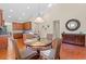 Lovely dining area connects to kitchen, with hardwood floors and a decorative mirror at 1524 Culbertson Ave., Myrtle Beach, SC 29577