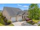 Charming home with a covered porch, two-car garage, and well-maintained landscaping at 1524 Culbertson Ave., Myrtle Beach, SC 29577