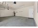A spacious two-car garage with concrete floors, a door to the outside, and garage door openers at 1524 Culbertson Ave., Myrtle Beach, SC 29577