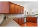 Spacious kitchen features stone countertops, stainless steel appliances, and wooden cabinets at 1524 Culbertson Ave., Myrtle Beach, SC 29577