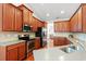 Well-equipped kitchen featuring stainless steel appliances, ample cabinets and granite countertops at 1524 Culbertson Ave., Myrtle Beach, SC 29577